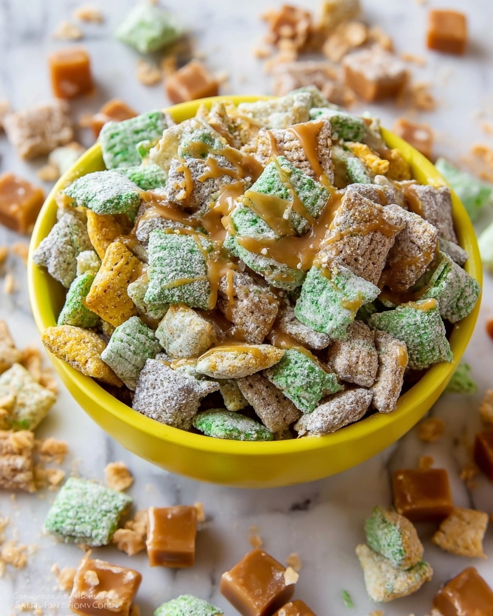 A bright yellow bowl filled with a colorful snack mix containing square cereal pieces coated in green, yellow, and light brown powder, with some pieces drizzled in a shiny caramel sauce. The cereal pieces have a crunchy texture with some powdered coating giving a slight rough look. The bowl is placed on a white marbled surface with scattered cereal pieces and caramel cubes around it, showing a casual and inviting scene. photo taken with an iphone --ar 4:5 --v 7