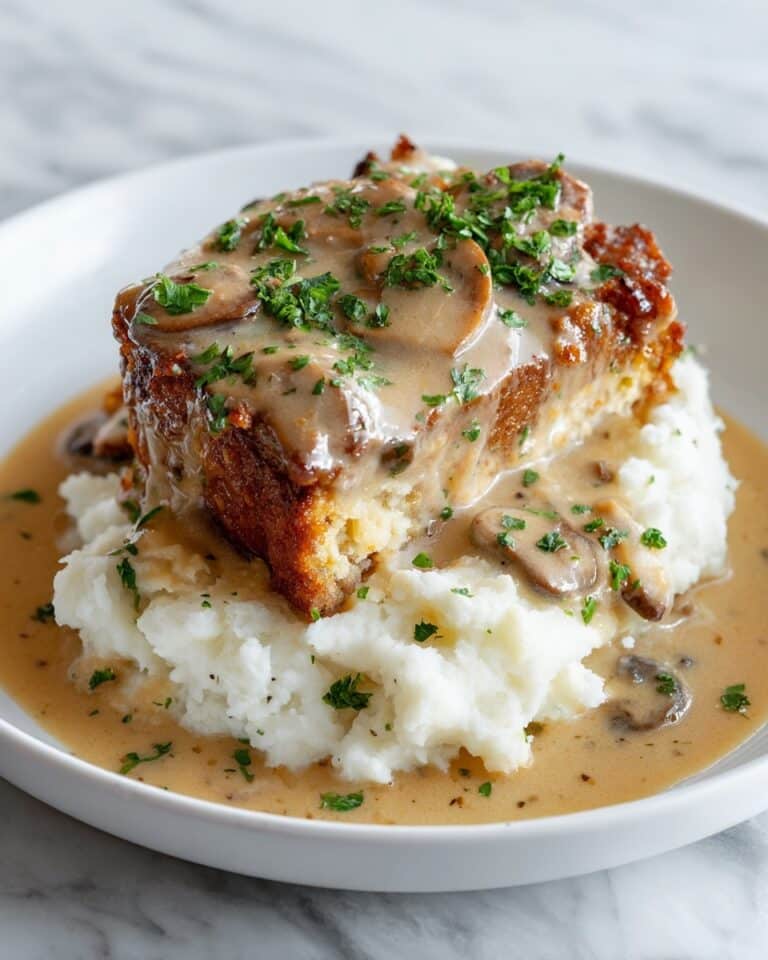 Smothered Chicken Thighs with Rich Gravy Recipe
