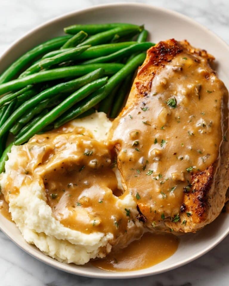 Smothered Chicken Breasts with Creamy Thyme Sauce Recipe